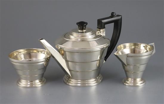 A George VI Art Deco silver three piece tea set, by A.L. Davenport Ltd, gross 19.5 oz.